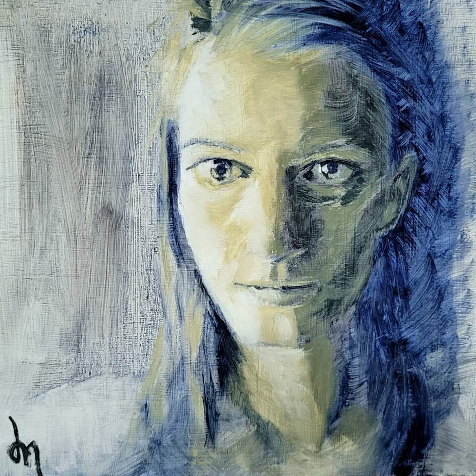 An oil self-portrait with deep shadows